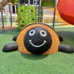 Textured surface of green and black recycled rubber granule safety flooring